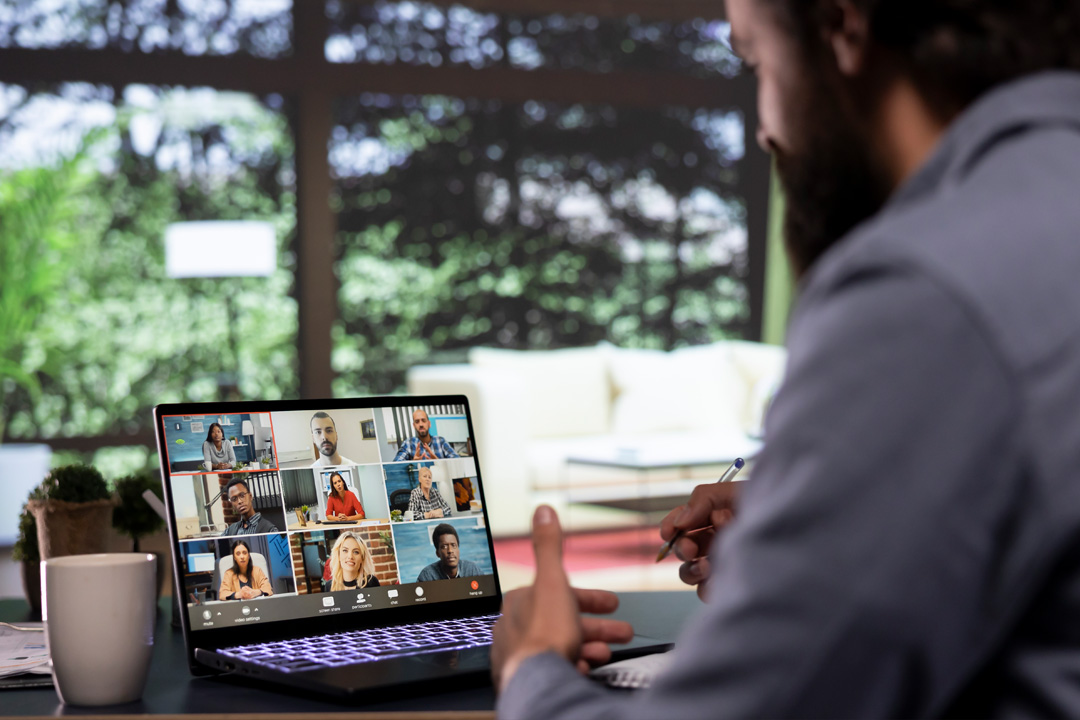 Remote participants collaborating together in a virtual video conference meeting